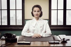 Woman sitting at desk: Liberty842 training